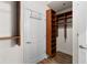 Walk-in closet with custom shelving and wood floors at 855 Peachtree Ne St # 1508, Atlanta, GA 30308