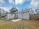 A spacious backyard with a patio and wooden fence offers an ideal outdoor space at 1454 Westridge Sw Rd, Atlanta, GA 30311
