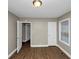 Bedroom with hardwood floors and access to hallway at 1454 Westridge Sw Rd, Atlanta, GA 30311