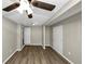 Spacious bedroom with neutral walls and hardwood floors at 1454 Westridge Sw Rd, Atlanta, GA 30311