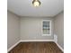 Bedroom with hardwood floors and a window at 1454 Westridge Sw Rd, Atlanta, GA 30311