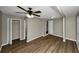 Well-lit bedroom with wood flooring and ceiling fan at 1454 Westridge Sw Rd, Atlanta, GA 30311