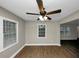 Bright dining room with neutral walls, hardwood floors, and ceiling fan at 1454 Westridge Sw Rd, Atlanta, GA 30311