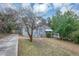House exterior showcasing a tree and driveway at 1454 Westridge Sw Rd, Atlanta, GA 30311