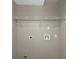Functional laundry room with shelving and hookups at 1454 Westridge Sw Rd, Atlanta, GA 30311