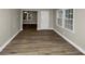 Spacious living room featuring hardwood floors and neutral tones at 1454 Westridge Sw Rd, Atlanta, GA 30311
