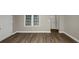Bright living room with hardwood floors and neutral walls at 1454 Westridge Sw Rd, Atlanta, GA 30311