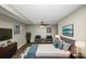 Spacious main bedroom with a ceiling fan and large windows at 1454 Westridge Sw Rd, Atlanta, GA 30311