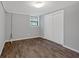 Finished basement room with wood-look flooring and large closet at 2144 Kennesaw Due West Nw Rd, Kennesaw, GA 30152