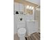 Well-lit bathroom featuring a vanity with a drawer, mirror, and shower with glass door at 2144 Kennesaw Due West Nw Rd, Kennesaw, GA 30152