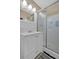 Bathroom featuring a vanity with a drawer and shower with a glass door at 2144 Kennesaw Due West Nw Rd, Kennesaw, GA 30152