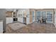 Bright eat-in kitchen area features stainless steel appliances and hardwood floors at 2144 Kennesaw Due West Nw Rd, Kennesaw, GA 30152