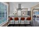 Spacious open-concept kitchen featuring breakfast bar and stainless steel appliances at 2144 Kennesaw Due West Nw Rd, Kennesaw, GA 30152