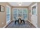 Cozy breakfast nook offering a table for two, natural light and bright trim at 2144 Kennesaw Due West Nw Rd, Kennesaw, GA 30152