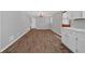 Open-concept living area featuring hardwood floors and neutral-toned walls at 2144 Kennesaw Due West Nw Rd, Kennesaw, GA 30152