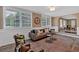 Comfortable living room boasting natural light, a decorative rug, and neutral tones at 2144 Kennesaw Due West Nw Rd, Kennesaw, GA 30152