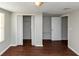 Bedroom with wood-look floors and closet at 2259 Nelms Sw Dr, Atlanta, GA 30315
