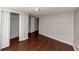 Bright bedroom featuring wood-look floors and closet at 2259 Nelms Sw Dr, Atlanta, GA 30315