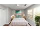 Cozy bedroom with a queen bed and wood floors at 2259 Nelms Sw Dr, Atlanta, GA 30315