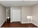 Simple bedroom with hardwood floors and large closet at 2259 Nelms Sw Dr, Atlanta, GA 30315