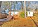 Brick ranch home with a landscaped yard and steps leading to the front entrance at 2259 Nelms Sw Dr, Atlanta, GA 30315