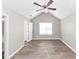 Main bedroom with vaulted ceiling and large window at 1162 Misty Meadows Xing, Hampton, GA 30228