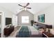 Main bedroom with vaulted ceiling and large window at 1162 Misty Meadows Xing, Hampton, GA 30228