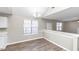 Bright dining room with hardwood floors and a chandelier at 1162 Misty Meadows Xing, Hampton, GA 30228