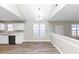 Kitchen with white cabinets and stainless steel appliances at 1162 Misty Meadows Xing, Hampton, GA 30228