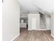 Open living space with hardwood floors and staircase at 1162 Misty Meadows Xing, Hampton, GA 30228