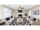Spacious living room with fireplace and neutral decor at 1162 Misty Meadows Xing, Hampton, GA 30228