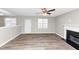 Living room with hardwood floors and fireplace at 1162 Misty Meadows Xing, Hampton, GA 30228