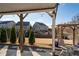 Covered patio with seating area and view of backyard at 423 Payne Rd, Woodstock, GA 30188