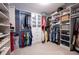 Large walk-in closet with ample shelving and hanging space at 423 Payne Rd, Woodstock, GA 30188