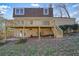 Exterior backyard view featuring a spacious deck and well-maintained yard at 3461 Valley View Dr, Marietta, GA 30068