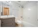 Clean bathroom with a tub, shower, and updated vanity at 3461 Valley View Dr, Marietta, GA 30068