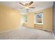 Well-lit bedroom with built-in shelves and ceiling fan at 3461 Valley View Dr, Marietta, GA 30068