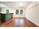 Dining room features hardwood floors and a view of the kitchen at 3461 Valley View Dr, Marietta, GA 30068