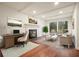 Living room with hardwood floors, fireplace, and seating area at 3461 Valley View Dr, Marietta, GA 30068