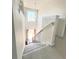 Carpeted staircase leading to the upper level at 6921 Foxmoor Way, Douglasville, GA 30134