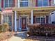 Welcoming front entrance with a charming red door and landscaping at 1326 Nantahala Ne Trl, Marietta, GA 30062