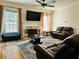 Relaxing living room with a fireplace and hardwood floors at 1326 Nantahala Ne Trl, Marietta, GA 30062