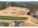 Aerial view of a golf driving range with multiple stations at 2960 Millwater Crossing, Dacula, GA 30019