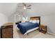 Comfortable bedroom featuring a ceiling fan and ample natural light at 2960 Millwater Xing, Dacula, GA 30019