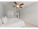 Bright bedroom featuring a vaulted ceiling, double closets, and neutral color palette at 2960 Millwater Xing, Dacula, GA 30019