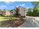 Charming two-story home with an inviting front lawn and mature landscaping at 2960 Millwater Xing, Dacula, GA 30019