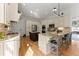 Spacious kitchen with granite countertops, stainless appliances, and center island with seating at 2960 Millwater Xing, Dacula, GA 30019