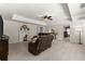 Cozy living room with a fireplace, comfortable seating, and neutral decor, perfect for relaxation and entertainment at 2960 Millwater Xing, Dacula, GA 30019