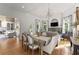 Open concept living and dining area with hardwood floors and ample natural light at 2960 Millwater Xing, Dacula, GA 30019