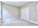 Bedroom has double bi-fold closet doors at 2106 Lacroix Way, Conyers, GA 30094